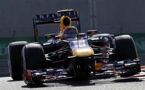 Red Bull Formula One driver Mark Webber of Australia takes a corner during the third practice session of the Abu Dhabi F1 Grand Prix at the Red Bull Formula One driver Mark Webber of Australia takes a corner during the third practice session of the Abu Dhabi F1 Grand Prix at the