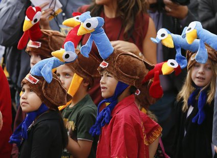 Children wear promotional turkey hats at the world premiere of the animated film "Free Birds" in Los Angeles, October 13, 2013. REUTERS/Dann Children wear promotional turkey hats at the world premiere of the animated film "Free Birds" in Los Angeles, October 13, 2013. REUTERS/Dann