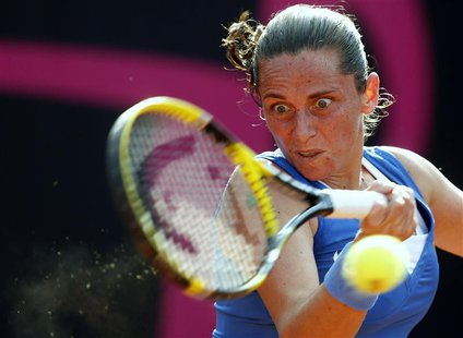 Italy's Roberta Vinci hits a return to Russia's Alexandra Panova during their Fed Cup World Group women's tennis final match in Cagliari, No Italy's Roberta Vinci hits a return to Russia's Alexandra Panova during their Fed Cup World Group women's tennis final match in Cagliari, No