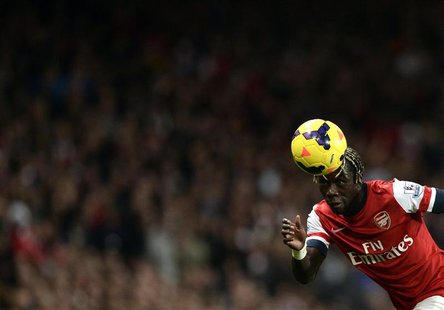 Arsenal's Bacary Sagna heads the ball during their English Premier League soccer match against Liverpool at the Emirates stadium in London N Arsenal's Bacary Sagna heads the ball during their English Premier League soccer match against Liverpool at the Emirates stadium in London N