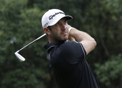 Dustin Johnson of the U.S. tees off on the third hole during the final round of the WGC-HSBC Champions golf tournament in Shanghai November Dustin Johnson of the U.S. tees off on the third hole during the final round of the WGC-HSBC Champions golf tournament in Shanghai November