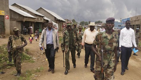 Congolese leaders of the M23 rebels are escorted in Bunagana, in eastern Democratic Republic of Congo, September 8, 2013. REUTERS/Kenny Kato Congolese leaders of the M23 rebels are escorted in Bunagana, in eastern Democratic Republic of Congo, September 8, 2013. REUTERS/Kenny Kato