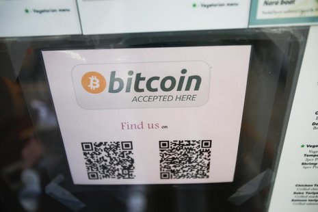 A Bitcoin logo is seen at the window of Nara Sushi, a restaurant that accepts Bitcoin, a form of digital currency, as payment in San Francis A Bitcoin logo is seen at the window of Nara Sushi, a restaurant that accepts Bitcoin, a form of digital currency, as payment in San Francis
