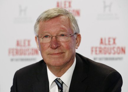 Former Manchester United manager Alex Ferguson poses before a news conference for his new autobiography at the Institute of Directors in Lon Former Manchester United manager Alex Ferguson poses before a news conference for his new autobiography at the Institute of Directors in Lon