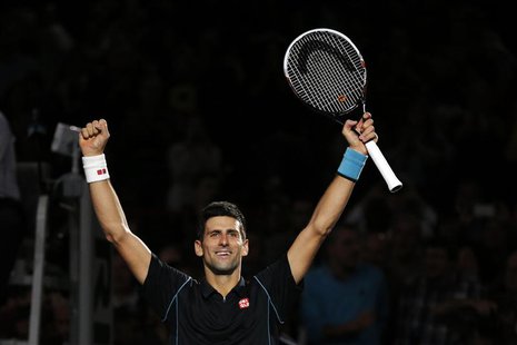 Novak Djokovic of Serbia reacts after defeating David Ferrer of Spain in the men's singles final match at the Paris Masters men's singles te Novak Djokovic of Serbia reacts after defeating David Ferrer of Spain in the men's singles final match at the Paris Masters men's singles te
