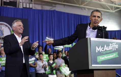 U.S. President Barack Obama delivers remarks at a campaign event for Terry McAuliffe (L) for Governor in Arlington, Virginia, November 3, 20 U.S. President Barack Obama delivers remarks at a campaign event for Terry McAuliffe (L) for Governor in Arlington, Virginia, November 3, 20