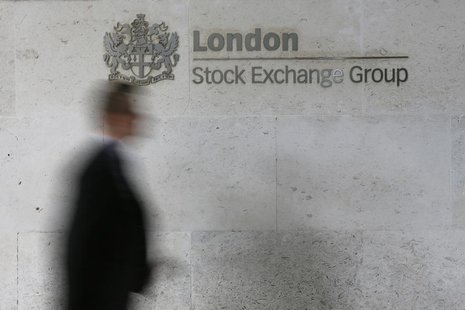 A man walks past the London Stock Exchange in the City of London October 11, 2013. REUTERS/Stefan Wermuth A man walks past the London Stock Exchange in the City of London October 11, 2013. REUTERS/Stefan Wermuth