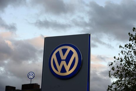 The logo of German carmaker Volkswagen is seen at a VW dealership in Hamburg, October 28, 2013. Volkswagen is due to present company results The logo of German carmaker Volkswagen is seen at a VW dealership in Hamburg, October 28, 2013. Volkswagen is due to present company results