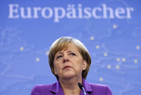 Germany's Chancellor Angela Merkel addresses a news conference during a European Union leaders summit in Brussels October 25, 2013. REUTERS/ Germany's Chancellor Angela Merkel addresses a news conference during a European Union leaders summit in Brussels October 25, 2013. REUTERS/