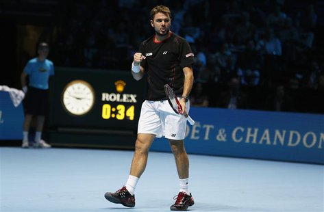 Stanislas Wawrinka of Switzerland celebrates breaking serve in the first set during his men's singles tennis match against Tomas Berdych of Stanislas Wawrinka of Switzerland celebrates breaking serve in the first set during his men's singles tennis match against Tomas Berdych of