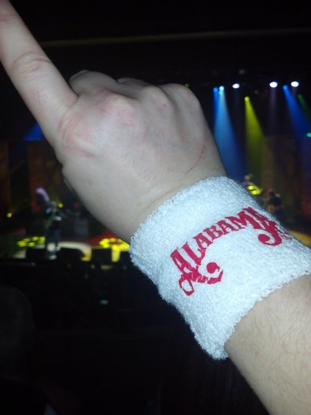 Charli watches Alabama at the Ryman