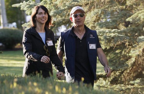 Amazon CEO Jeff Bezos (R) and his wife MacKenzie arrive at the annual Allen and Co. conference at the Sun Valley, Idaho Resort July 12, 2013 Amazon CEO Jeff Bezos (R) and his wife MacKenzie arrive at the annual Allen and Co. conference at the Sun Valley, Idaho Resort July 12, 2013