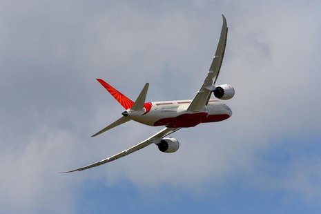 An Air India Airlines Boeing 787 dreamliner takes part in a flying display during the 50th Paris Air Show at the Le Bourget airport near Par An Air India Airlines Boeing 787 dreamliner takes part in a flying display during the 50th Paris Air Show at the Le Bourget airport near Par