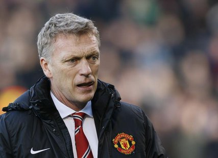 Manchester United manager David Moyes walks onto the pitch before their English Premier League soccer match against Fulham at Craven Cottage Manchester United manager David Moyes walks onto the pitch before their English Premier League soccer match against Fulham at Craven Cottage