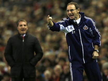Sunderland's manager Martin O'Neill instructs his team during their English Premier League soccer match against Liverpool at Anfield in Live Sunderland's manager Martin O'Neill instructs his team during their English Premier League soccer match against Liverpool at Anfield in Live