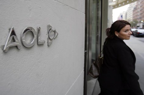 A woman walks out of AOL offices in New York, November 19, 2009. REUTERS/Shannon Stapleton A woman walks out of AOL offices in New York, November 19, 2009. REUTERS/Shannon Stapleton
