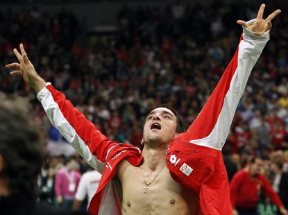 Serbia's Viktor Troicki celebrates his team's victory of the Davis Cup in Belgrade December 5, 2010. REUTERS/Ivan Milutinovic Serbia's Viktor Troicki celebrates his team's victory of the Davis Cup in Belgrade December 5, 2010. REUTERS/Ivan Milutinovic