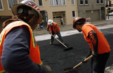 Workers spread asphalt on a street in the Cow Hollow neighborhood in San Francisco, California June 2, 2010. REUTERS/Robert Galbraith Workers spread asphalt on a street in the Cow Hollow neighborhood in San Francisco, California June 2, 2010. REUTERS/Robert Galbraith