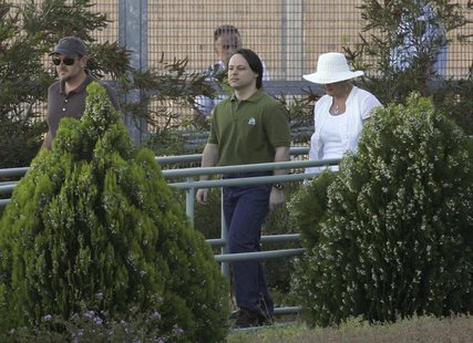 Former Guantanamo Bay detainee David Hicks (C) walks away from Yatala Prison with his former step mother Bronwyn Mewett in Adelaide December Former Guantanamo Bay detainee David Hicks (C) walks away from Yatala Prison with his former step mother Bronwyn Mewett in Adelaide December