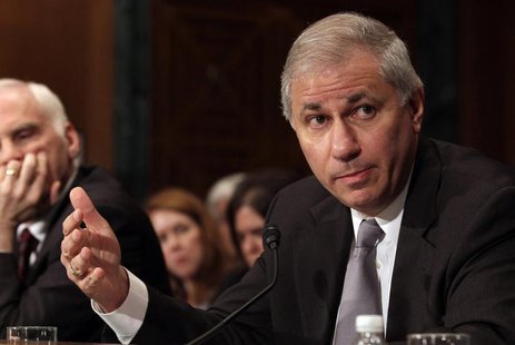 Martin Gruenberg, chairman of the Federal Deposit Insurance Corporation, gestures as he testifies before a Senate Banking, Housing and Urban Martin Gruenberg, chairman of the Federal Deposit Insurance Corporation, gestures as he testifies before a Senate Banking, Housing and Urban