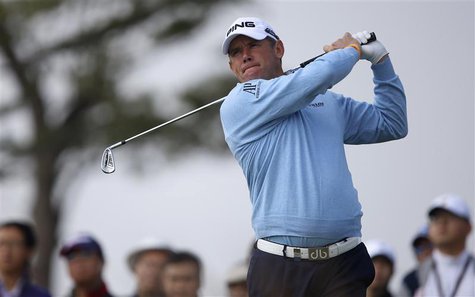 Lee Westwood of the U.S. tees off on the second hole during the BMW Masters 2013 golf tournament at Lake Malaren Golf Club in Shanghai Octob Lee Westwood of the U.S. tees off on the second hole during the BMW Masters 2013 golf tournament at Lake Malaren Golf Club in Shanghai Octob