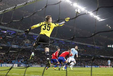 Manchester City's Alvaro Negredo (R) heads to score his third goal against CSKA Moscow during their Champions League soccer match at the Eti Manchester City's Alvaro Negredo (R) heads to score his third goal against CSKA Moscow during their Champions League soccer match at the Eti