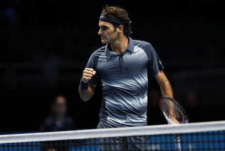 Roger Federer of Switzerland celebrates winning the second set of his men's singles tennis match against Novak Djokovic of Serbia at the ATP Roger Federer of Switzerland celebrates winning the second set of his men's singles tennis match against Novak Djokovic of Serbia at the ATP