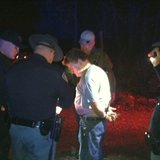 Photo 1 is Elmer Seeley (white shirt) as he is taken into custody.
photo courtesy of Indiana State Police Photo 1 is Elmer Seeley (white shirt) as he is taken into custody.
photo courtesy of Indiana State Police