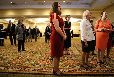 Amber Larsen (C) and fellow Republican supporters wait for poll numbers and election results at Virginia Republican gubernatorial nominee Ke Amber Larsen (C) and fellow Republican supporters wait for poll numbers and election results at Virginia Republican gubernatorial nominee Ke