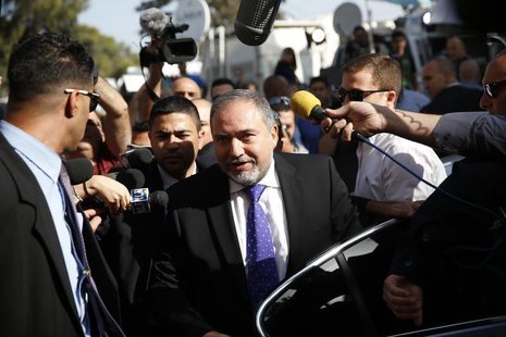 Former Israeli Foreign Minister Avigdor Lieberman, (C) steps out of a car as he arrives to hear the verdict in the corruption charges agains Former Israeli Foreign Minister Avigdor Lieberman, (C) steps out of a car as he arrives to hear the verdict in the corruption charges agains
