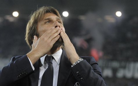 Juventus' coach Antonio Conte acknowledges the crowd before the Italian Serie A soccer match against Catania at the Juventus stadium in Turi Juventus' coach Antonio Conte acknowledges the crowd before the Italian Serie A soccer match against Catania at the Juventus stadium in Turi