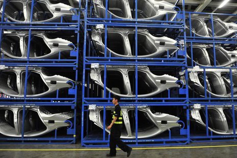 Security personnel walks inside a BMW factory in Shenyang, Liaoning province, July 6, 2013. REUTERS/Stringer Security personnel walks inside a BMW factory in Shenyang, Liaoning province, July 6, 2013. REUTERS/Stringer