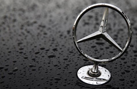 The emblem of German car manufacturer Mercedes-Benz, a subsidiary of Daimler AG, is pictured covered with raindrops at a parking lot in Hana The emblem of German car manufacturer Mercedes-Benz, a subsidiary of Daimler AG, is pictured covered with raindrops at a parking lot in Hana