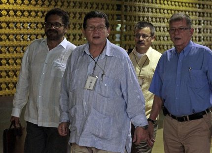 Negotiator for Colombia's Revolutionary Armed Forces of Colombia (FARC) rebel force Pablo Catatumbo (2nd L) arrives for peace talks with lea Negotiator for Colombia's Revolutionary Armed Forces of Colombia (FARC) rebel force Pablo Catatumbo (2nd L) arrives for peace talks with lea
