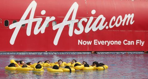 The logo of Malaysia's low-cost airline AirAsia Berhad is pictured on a structure as its staff undergo training at its academy in Sepang out The logo of Malaysia's low-cost airline AirAsia Berhad is pictured on a structure as its staff undergo training at its academy in Sepang out