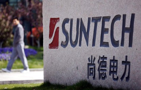 A man walks past Suntech Power Holdings' headquarters in Wuxi, Jiangsu province, in this March 21, 2013 file photo. REUTERS/Stringer/Files A man walks past Suntech Power Holdings' headquarters in Wuxi, Jiangsu province, in this March 21, 2013 file photo. REUTERS/Stringer/Files