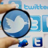 A person holds a magnifying glass over a computer screen displaying Twitter logos, in this picture illustration taken in Skopje September 10 A person holds a magnifying glass over a computer screen displaying Twitter logos, in this picture illustration taken in Skopje September 10