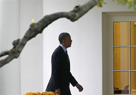 U.S. President Barack Obama walks to the Oval Office of the White House in Washington after visiting the Walter Reed National Military Medic U.S. President Barack Obama walks to the Oval Office of the White House in Washington after visiting the Walter Reed National Military Medic