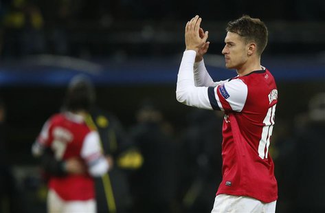 Arsenal's Aaron Ramsey celebrates after defeating Borussia Dortmund in their Champions League Group F soccer match in Dortmund November 6, 2 Arsenal's Aaron Ramsey celebrates after defeating Borussia Dortmund in their Champions League Group F soccer match in Dortmund November 6, 2