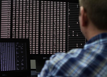 An analyst looks at code in the malware lab of a cyber security defense lab at the Idaho National Laboratory in Idaho Falls, Idaho September An analyst looks at code in the malware lab of a cyber security defense lab at the Idaho National Laboratory in Idaho Falls, Idaho September