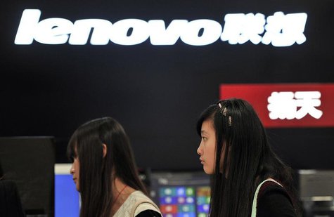 People walk past a Lenovo shop in Hefei, Anhui province, October 18, 2013. REUTERS/Stringer People walk past a Lenovo shop in Hefei, Anhui province, October 18, 2013. REUTERS/Stringer