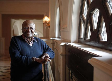 The former Anglican archbishop Desmond Tutu poses for a photograph after an interview with Reuters in New Delhi November 7, 2013. REUTERS/An The former Anglican archbishop Desmond Tutu poses for a photograph after an interview with Reuters in New Delhi November 7, 2013. REUTERS/An