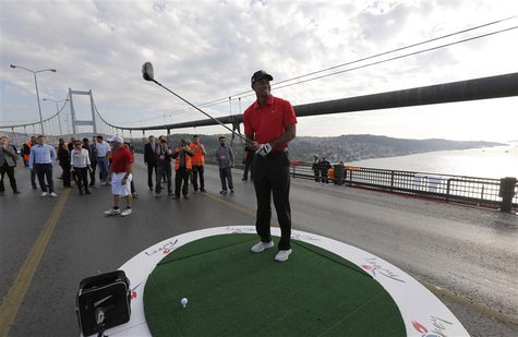 U.S. golfer Tiger Woods gets ready to hit a shot during an event to promote the upcoming Turkish Airlines Open golf tournament, on the Bosph U.S. golfer Tiger Woods gets ready to hit a shot during an event to promote the upcoming Turkish Airlines Open golf tournament, on the Bosph