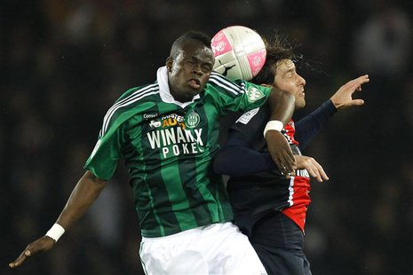 Paris St Germain's Maxwell (R) challenges Saint Etienne's Ismael Diomande during their French Ligue 1 soccer match at Parc des Princes stadi Paris St Germain's Maxwell (R) challenges Saint Etienne's Ismael Diomande during their French Ligue 1 soccer match at Parc des Princes stadi