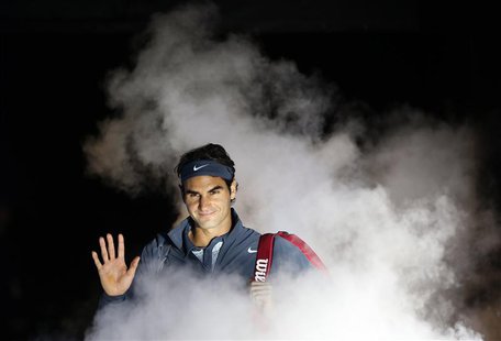 Roger Federer of Switzerland arrives for his men's singles tennis match against Richard Gasquet of France at the ATP World Tour Finals at th Roger Federer of Switzerland arrives for his men's singles tennis match against Richard Gasquet of France at the ATP World Tour Finals at th