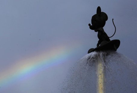 A rainbow is seen behind a fountain featuring Mickey Mouse at the entrance of Hong Kong Disneyland July 13, 2012. REUTERS/Bobby Yip A rainbow is seen behind a fountain featuring Mickey Mouse at the entrance of Hong Kong Disneyland July 13, 2012. REUTERS/Bobby Yip