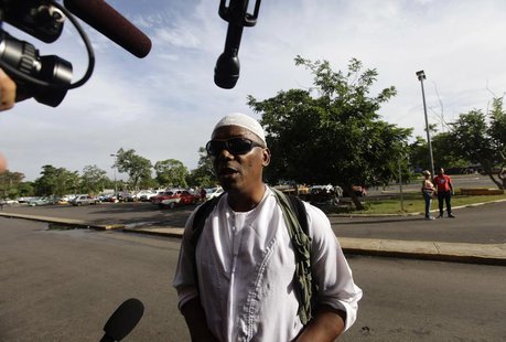 William Potts speaks to reporters outside Havana's Jose Marti International Airport, before boarding a plane to the U.S. November 6, 2013. R William Potts speaks to reporters outside Havana's Jose Marti International Airport, before boarding a plane to the U.S. November 6, 2013. R