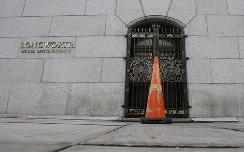 An orange cone blocks an entrance into the Longworth House Office Building on Capitol Hill in Washington after the U.S. Government shut down An orange cone blocks an entrance into the Longworth House Office Building on Capitol Hill in Washington after the U.S. Government shut down
