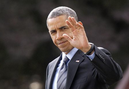 U.S. President Barack Obama waves as he walks on the South Lawn of the White House in Washington before his departure to the Walter Reed Nat U.S. President Barack Obama waves as he walks on the South Lawn of the White House in Washington before his departure to the Walter Reed Nat