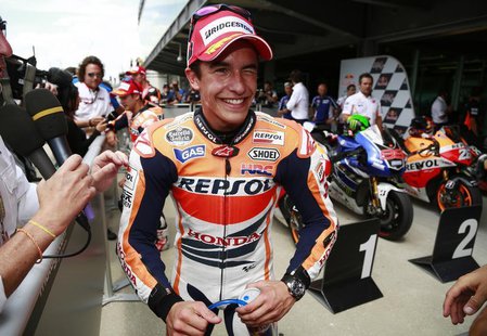 Honda MotoGP rider Marc Marquez of Spain winks after qualifying in pole position for the Indianapolis Grand Prix in Indianapolis August 17, Honda MotoGP rider Marc Marquez of Spain winks after qualifying in pole position for the Indianapolis Grand Prix in Indianapolis August 17,